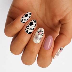 Glossy nail wraps with cow print, floral accents, cute cow face, mauve pink