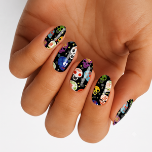 Black nail wraps with colorful Day of the Dead sugar skull designs, glossy finish