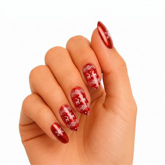 Metallic red semi-cured gel nail wraps with white reindeer and snowflake Fair Isle pattern