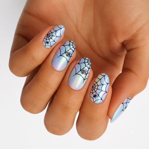 Iridescent pearl press-on nails with black spiderweb and spider Halloween design