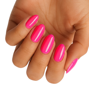 Glossy neon pink semi-cured gel nail wraps on almond-shaped nails.