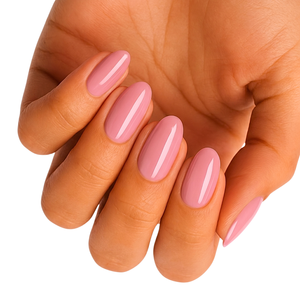 Glossy dusty pink nail wraps in a solid colour on almond-shaped nails