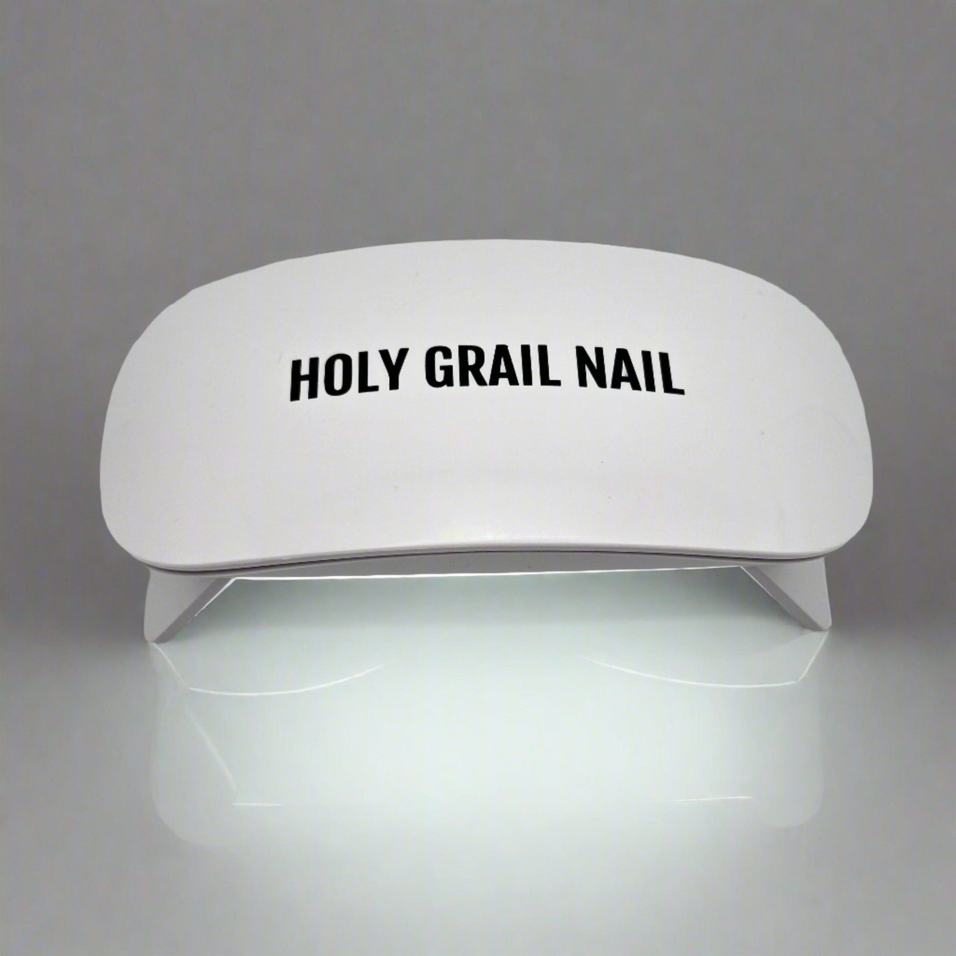 White UV LED nail lamp for curing gel nails at home manicure