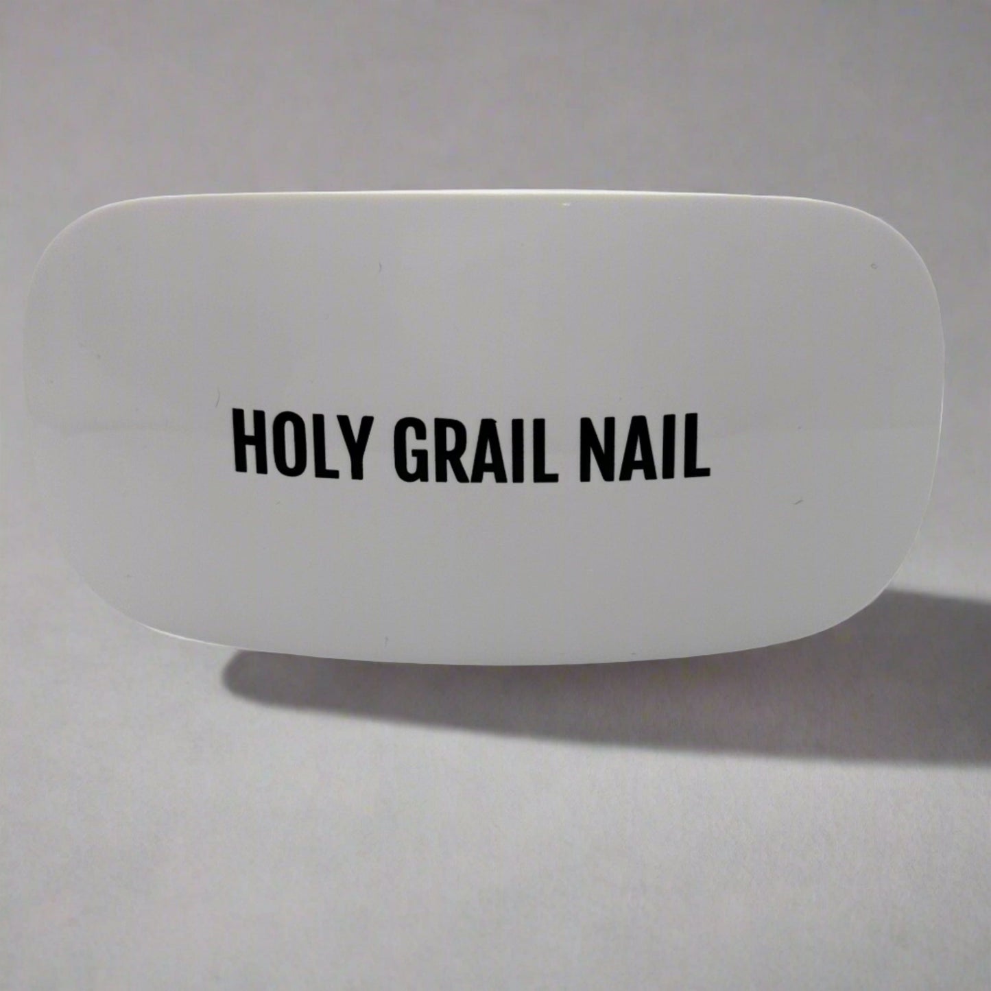 Compact white UV lamp for professional gel nail curing at home