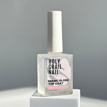 Clear glossy top coat nail polish bottle for at-home manicure finishing