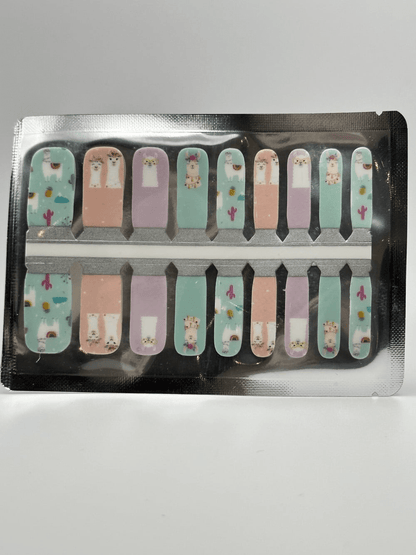 Sheet of kids nail wraps with adorable llama patterns in mint and pink
