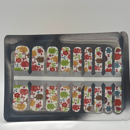 Colourful elephant print kids nail wraps with cartoon animals in red green orange