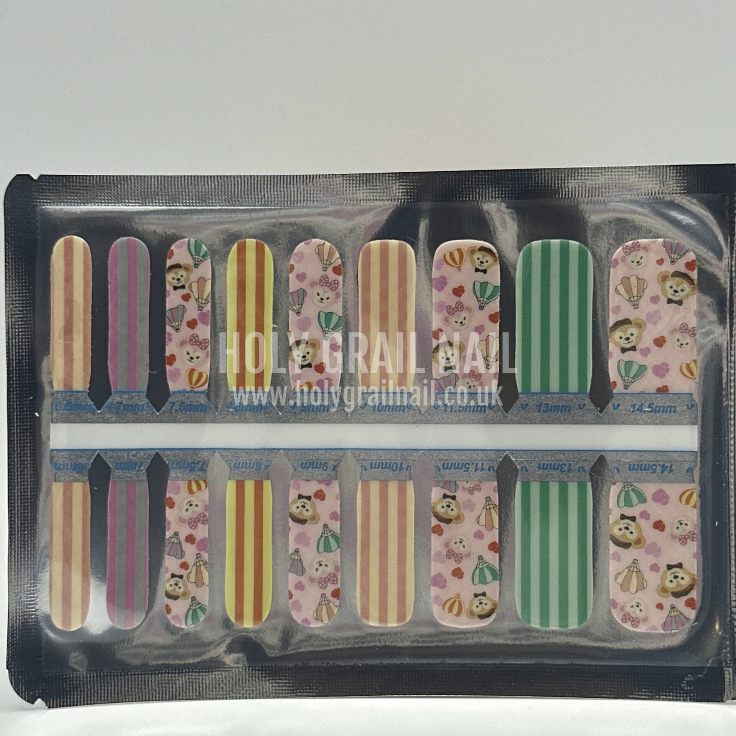 Kids nail wraps sheet featuring adorable teddy bears hearts and colourful striped patterns for children