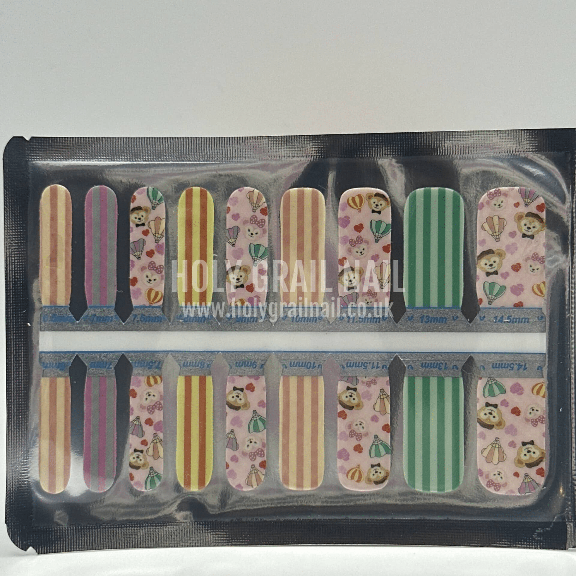 Kids nail wraps sheet featuring adorable teddy bears hearts and colourful striped patterns for children