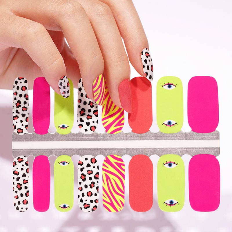 Colourful pop art nail wraps sheet with eye motifs in pink coral lime green
