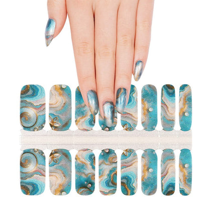 Aqua marble nail wraps sheet with gold accents and hand model showing luxury gel nail art