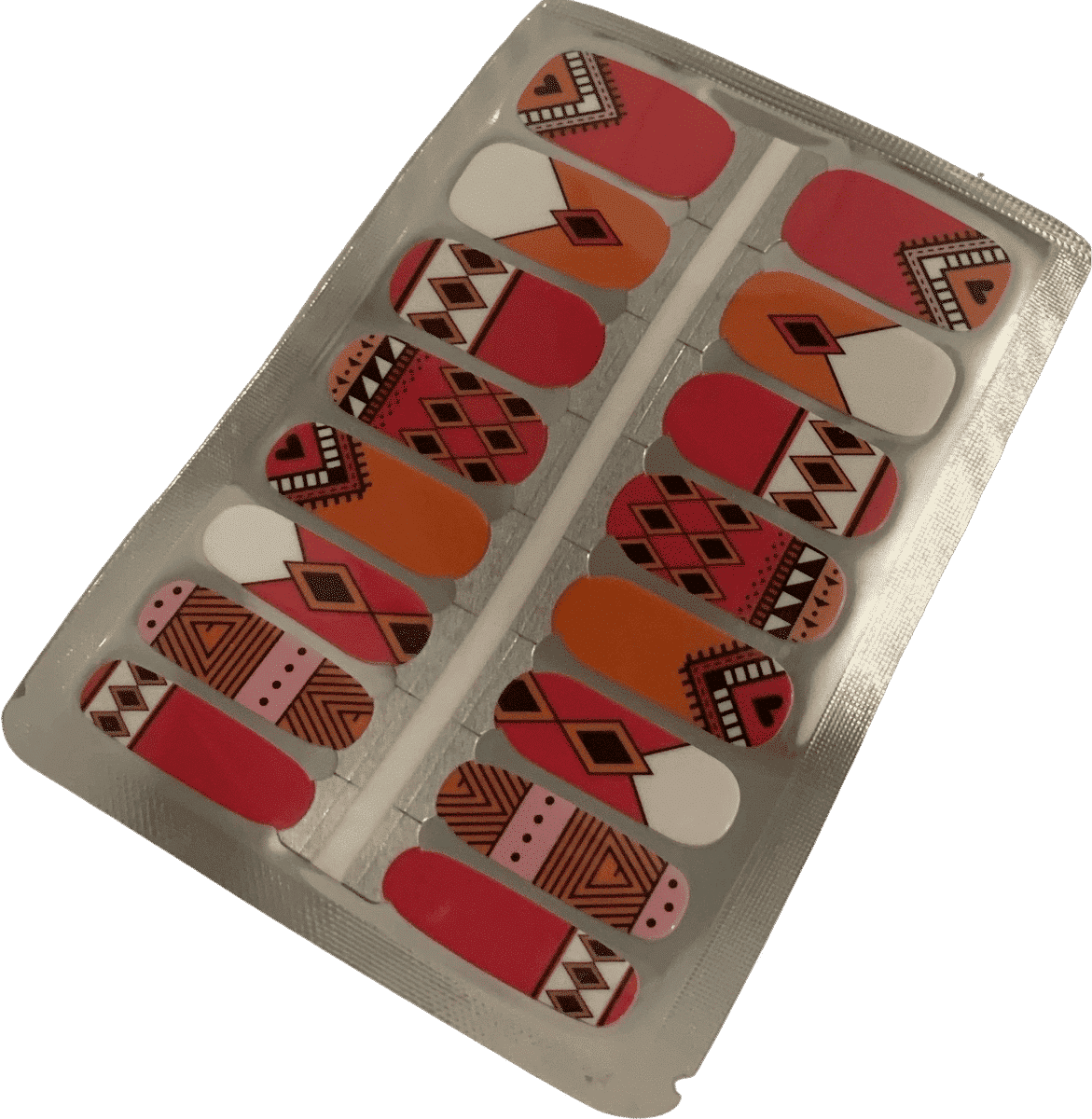 Non-UV nail wraps sheet featuring pink orange geometric tribal patterns for at-home manicure