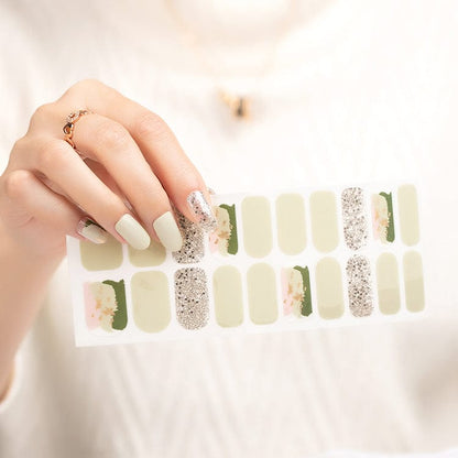 Sage green and gold glitter nail wraps sheet showing 20 pieces for DIY manicure