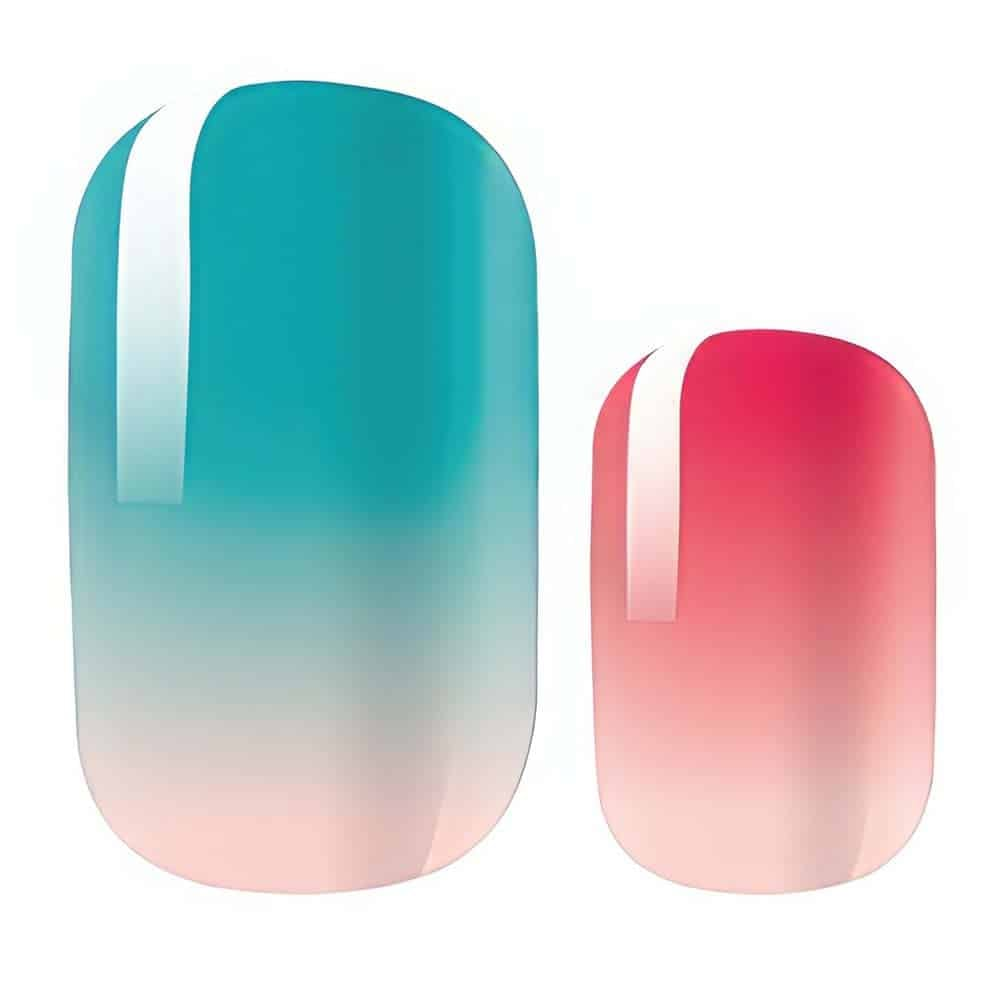 Glossy ombre nail wraps in teal to pink gradient showing smooth colour transition