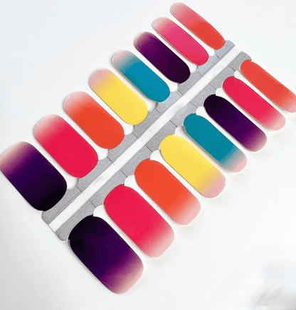 Rainbow ombre nail wraps sheet showing vibrant gradient colours from pink to purple