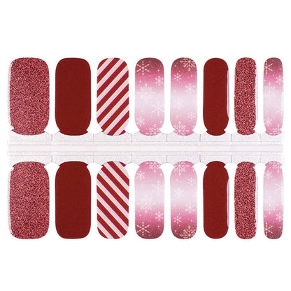 Red and pink Christmas nail wraps sheet with glitter, ombre and candy cane stripe designs