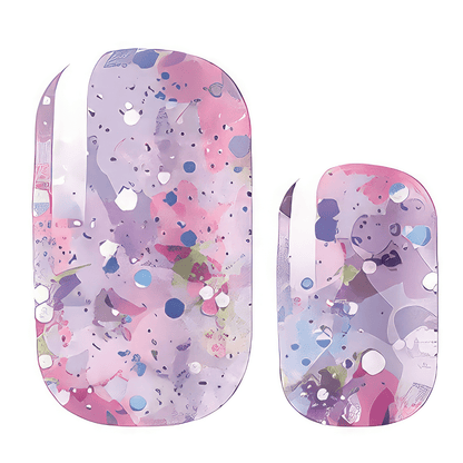 Close-up of purple and pink glitter nail wraps with holographic sparkles nail art design