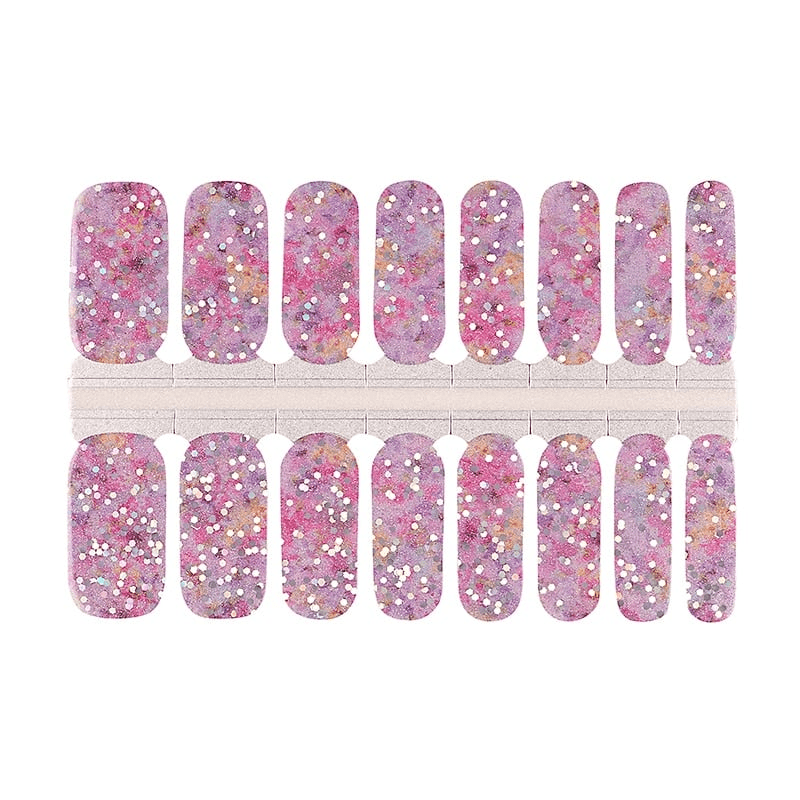 Purple glitter nail wraps with sparkly confetti pattern for at-home manicure nail art