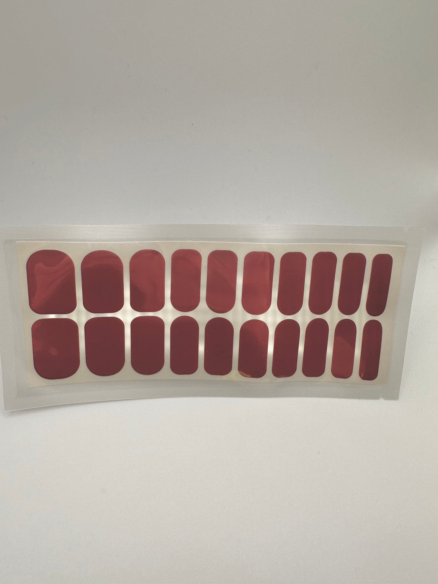 Deep burgundy solid colour gel nail wraps in wide fit set of 20 pieces for at-home manicure
