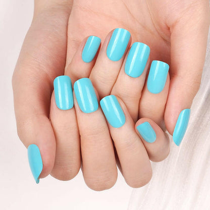 Bright blue glossy gel nail wraps displayed on both hands for at-home manicure