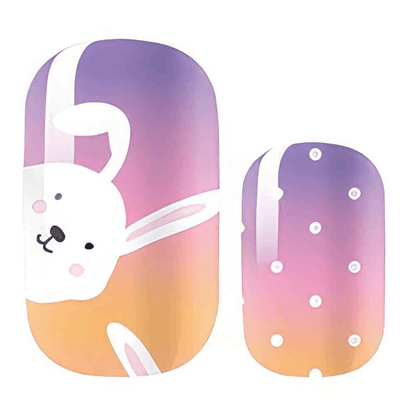 Bunny rabbit nail art wraps with polka dots on gradient purple orange
