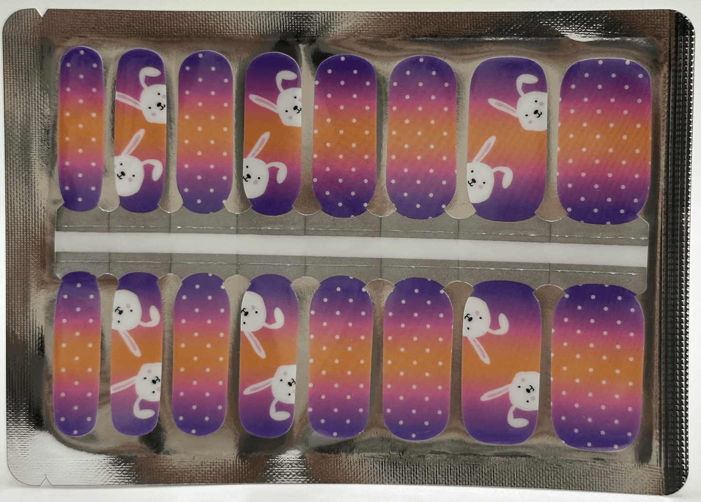 Easter bunny nail wrap strips in purple to orange ombre design
