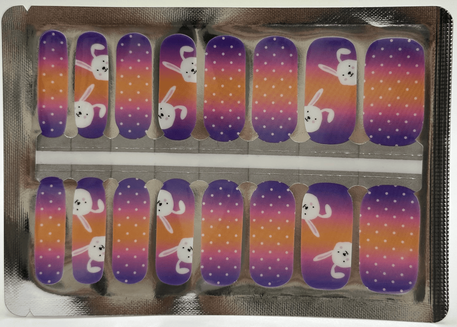 Easter bunny nail wrap strips in purple to orange ombre design