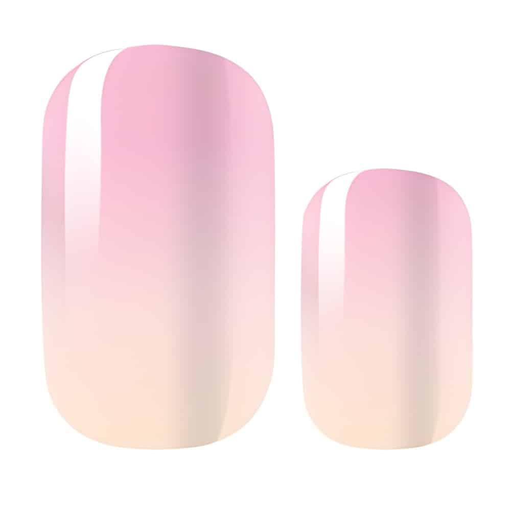 Individual pink ombre nail wraps showing gradient effect from pink to cream