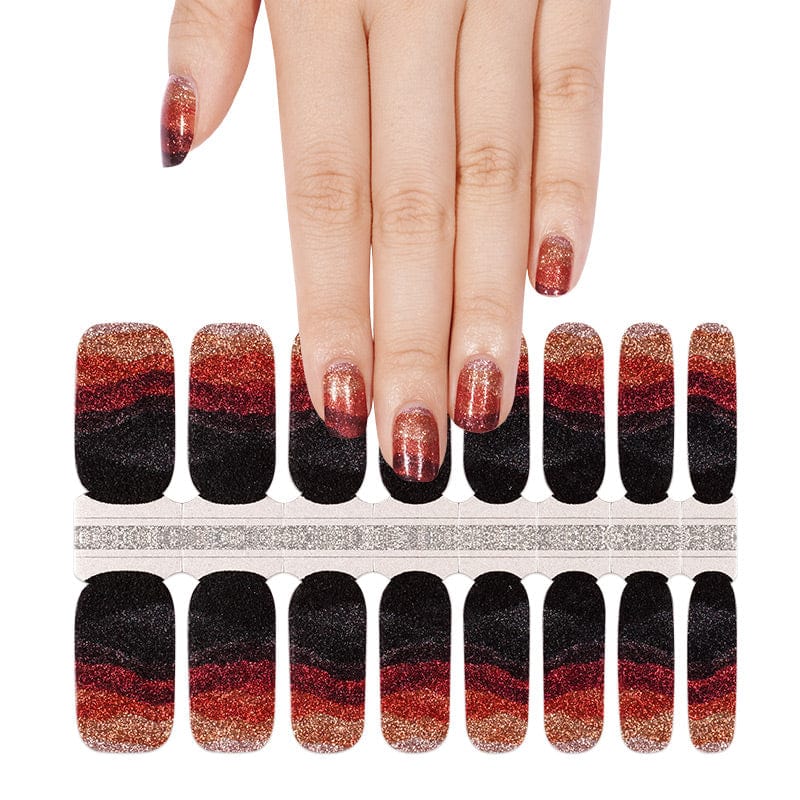 Red and black glitter gradient nail wraps displayed with manicured hand showing ombre effect