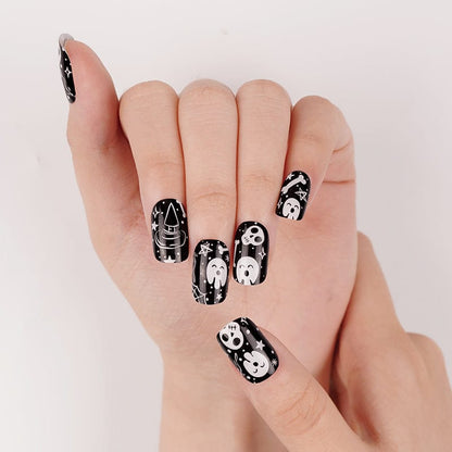 Halloween skull nail art wraps on natural nails at-home manicure