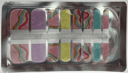 Glitter pedicure nail wraps in purple yellow blue with rainbow wave patterns for toe nail art