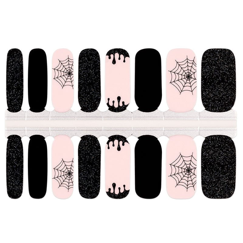 Gothic nail wrap sheet with black glitter, pink spider web and drip patterns