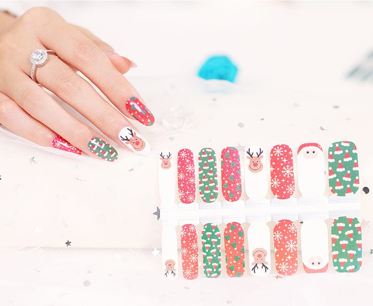 Christmas nail art wraps sheet showing Santa, reindeer and festive patterns for at-home manicure