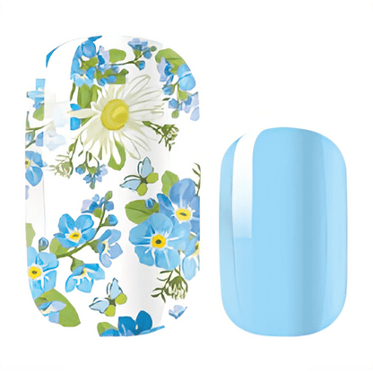 Blue floral nail wraps with white daisies and forget-me-nots for spring manicure