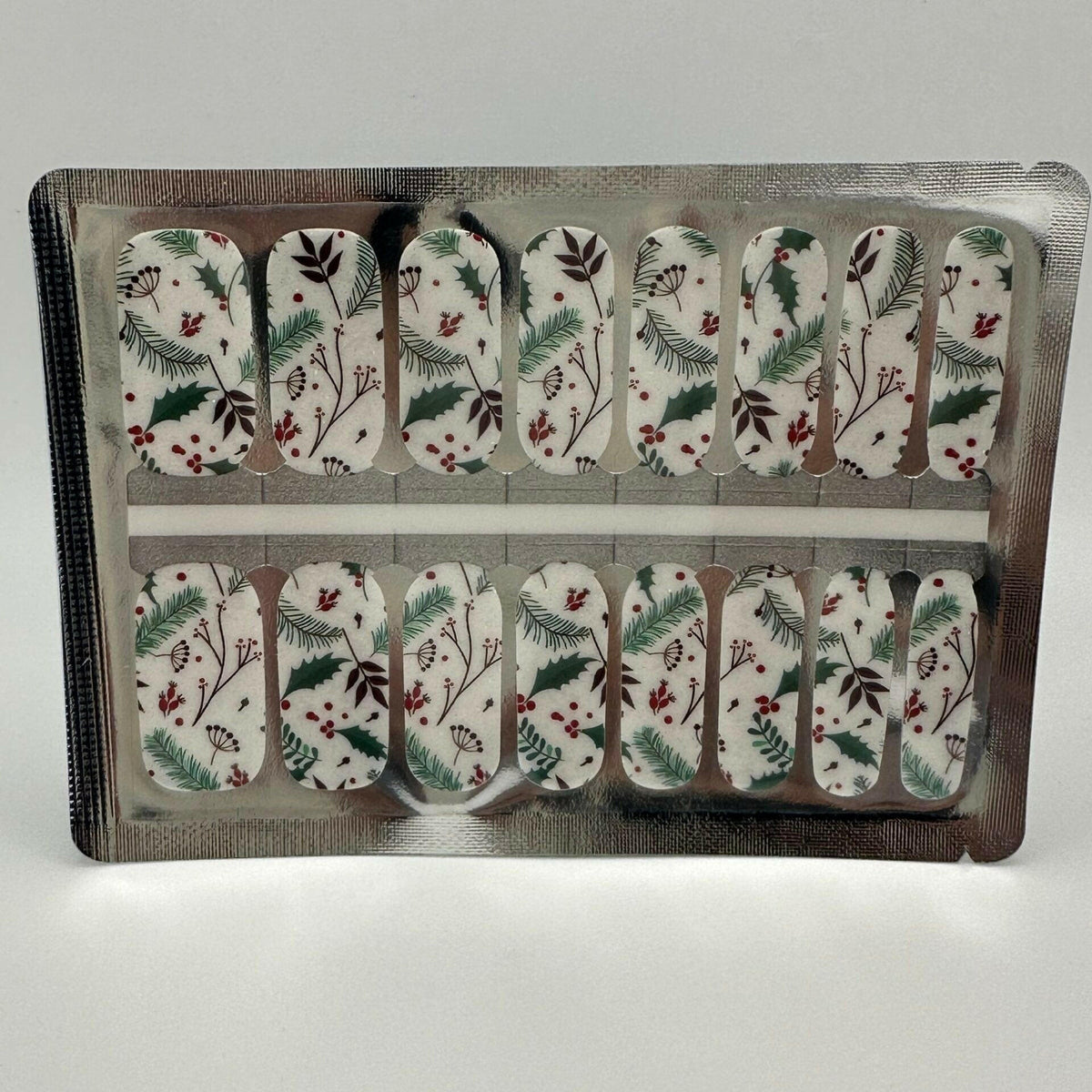 Nail wraps, white with holly, pine sprigs and red berry festive print