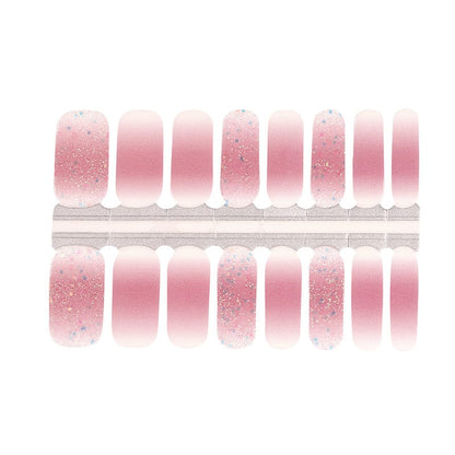 Pink gradient nail wraps with shimmer finish for at-home manicure application