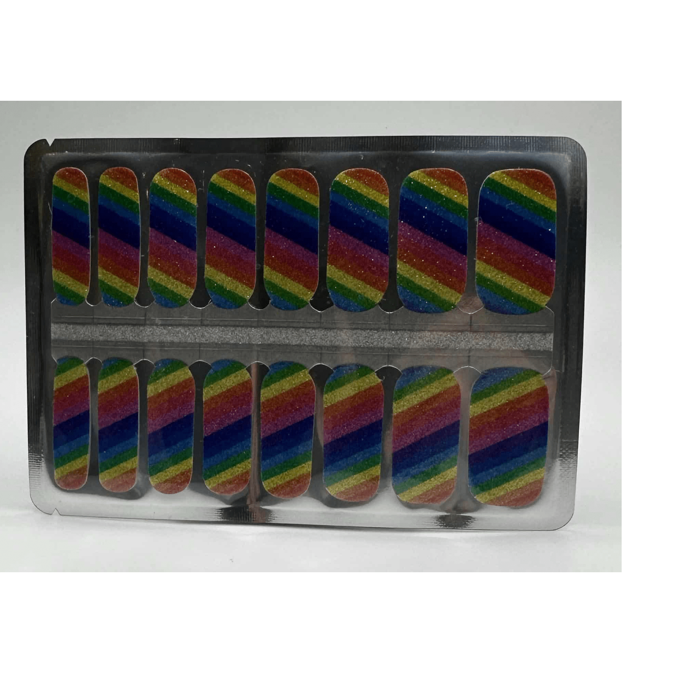 Rainbow glitter diagonal stripe nail wraps sheet showing pride colours for at-home manicure