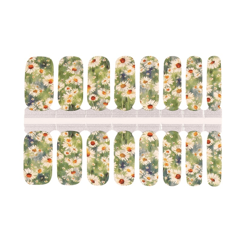 Sage green floral nail wrap sheet with white daisy pattern for DIY manicure