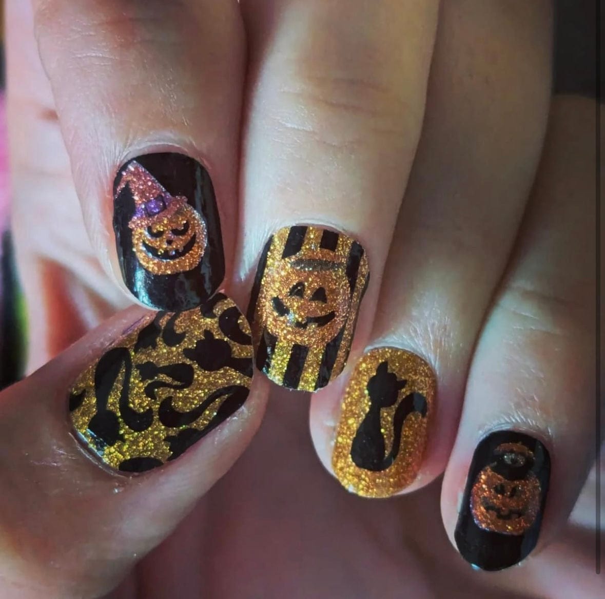 Spooky Halloween nail wraps with gold glitter black orange pumpkin cat designs