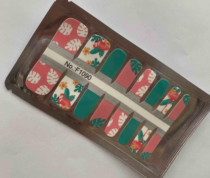 Non-UV pedicure nail wraps in packaging featuring flamingo and tropical leaf patterns