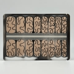 Non-UV nail wraps in nude beige with black abstract wavy pattern design sheet