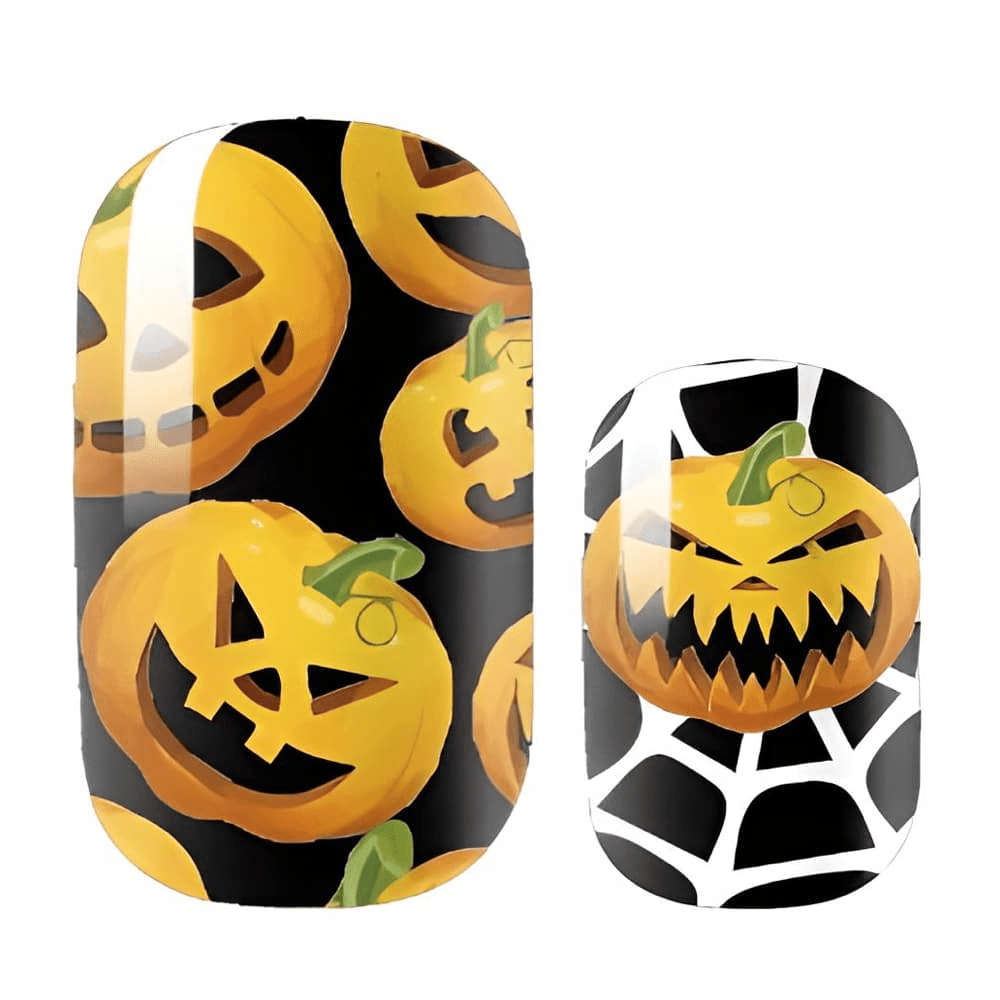 Halloween nail wraps with orange pumpkin faces black background spider web accent design