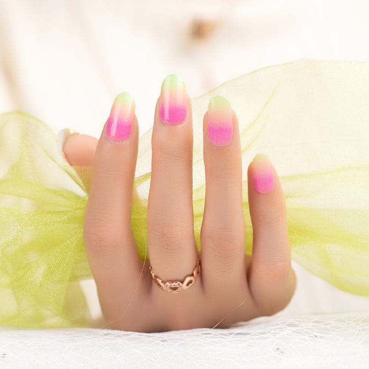 Rainbow ombre nail wraps on hand pink green gradient design festival nail art
