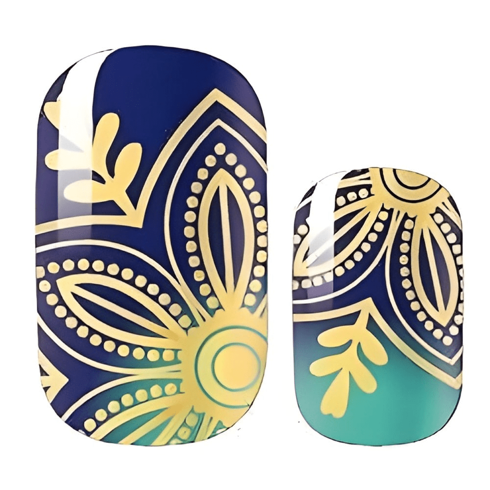 Golden lotus nail wraps with navy blue gradient and ornate metallic pattern