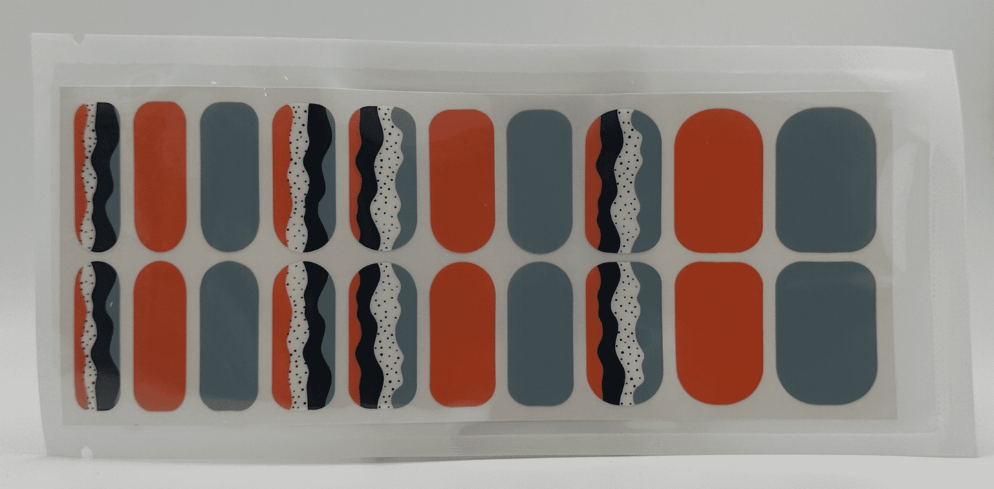 Wide fit nail wraps sheet featuring retro geometric patterns in orange blue black colours