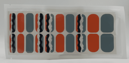 Wide fit nail wraps sheet featuring retro geometric patterns in orange blue black colours
