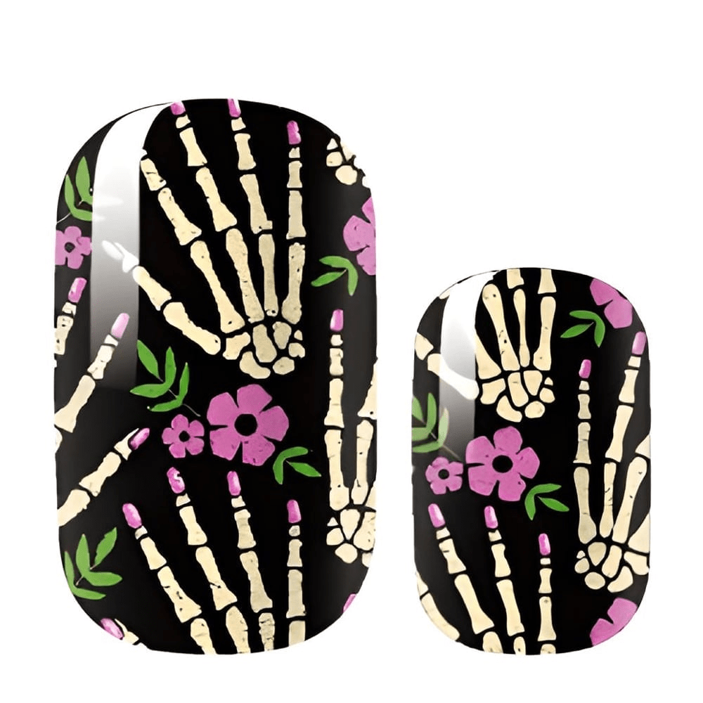 Black non-UV nail wraps with cream skeleton hands and pink flowers Halloween design