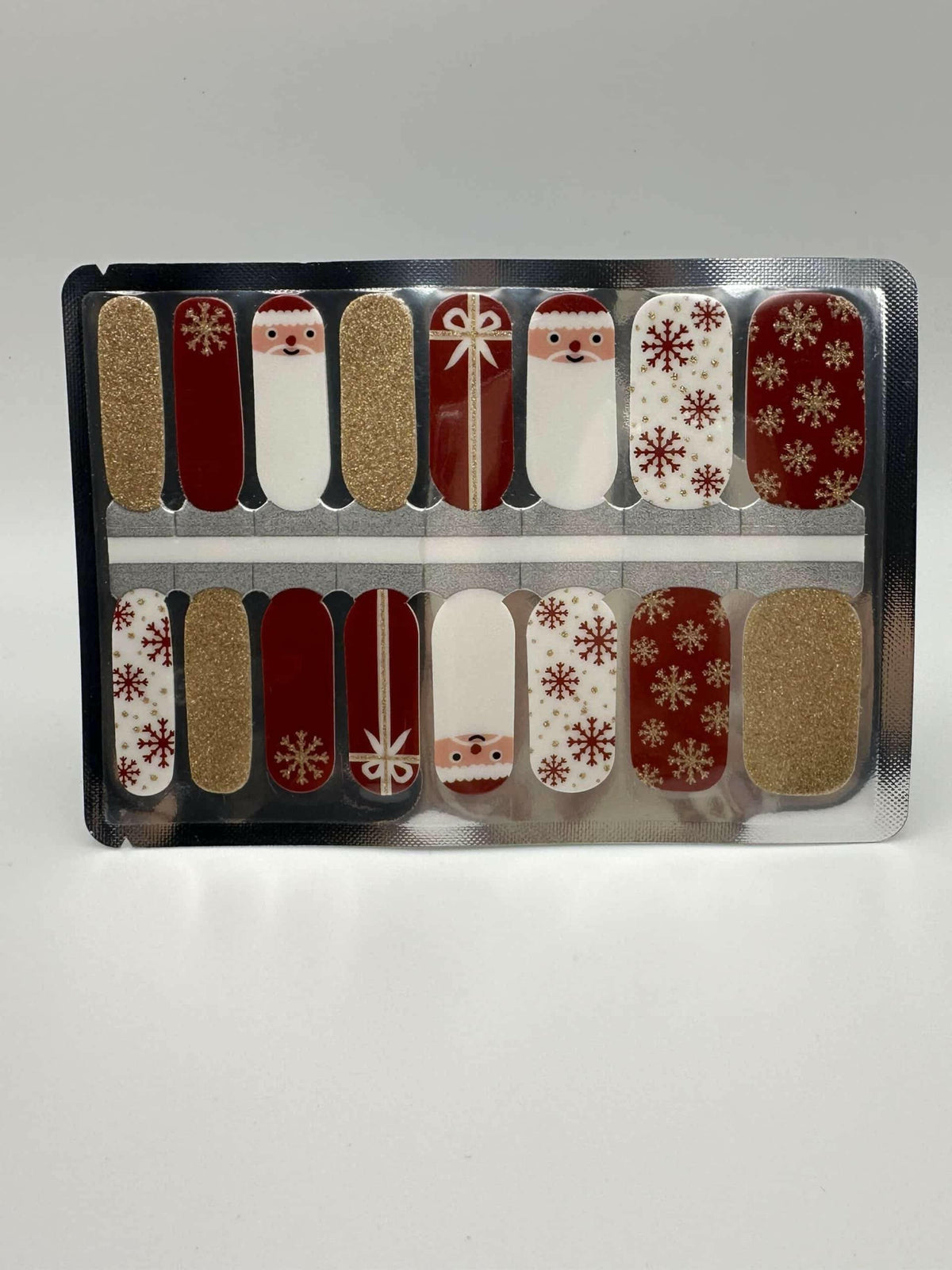 Christmas nail wraps sheet with red gold glitter Santa snowflake patterns for festive manicure