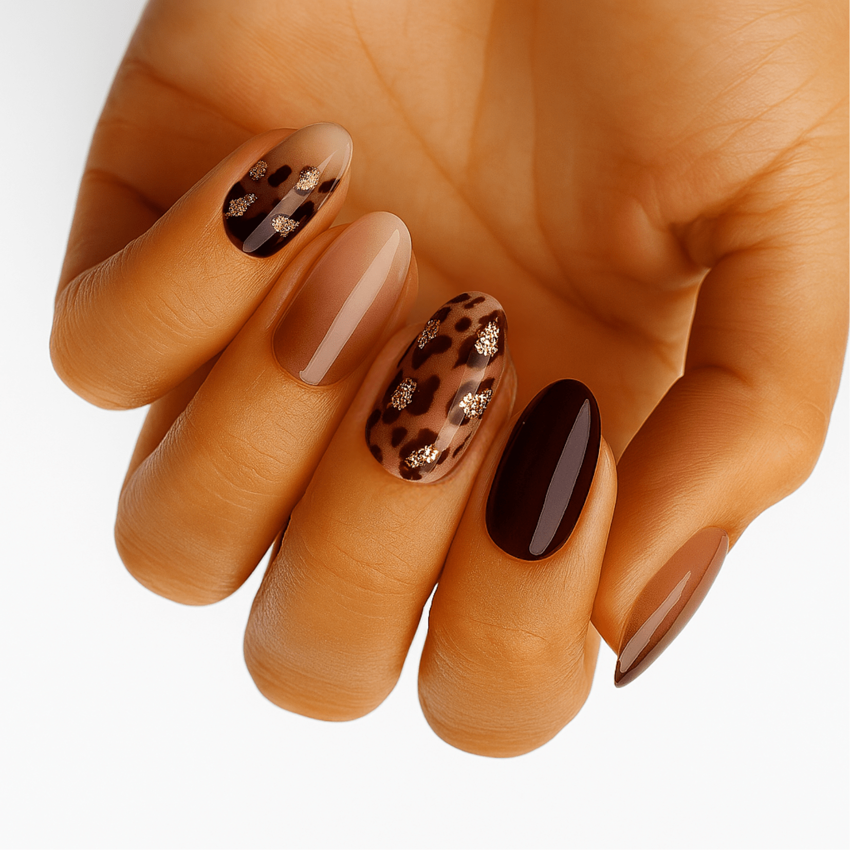 Brown leopard print gel nail wraps with glossy finish on hand manicure
