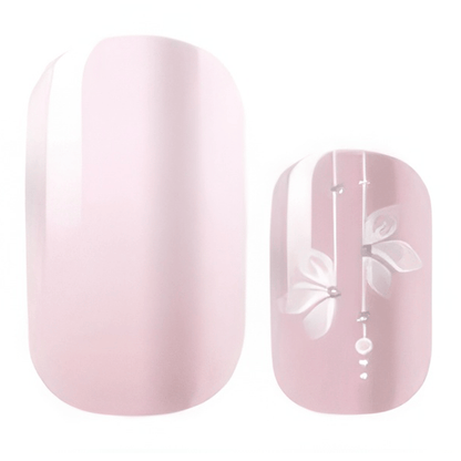 Pink matte nail wraps with white cherry blossom floral design and dangling chain details